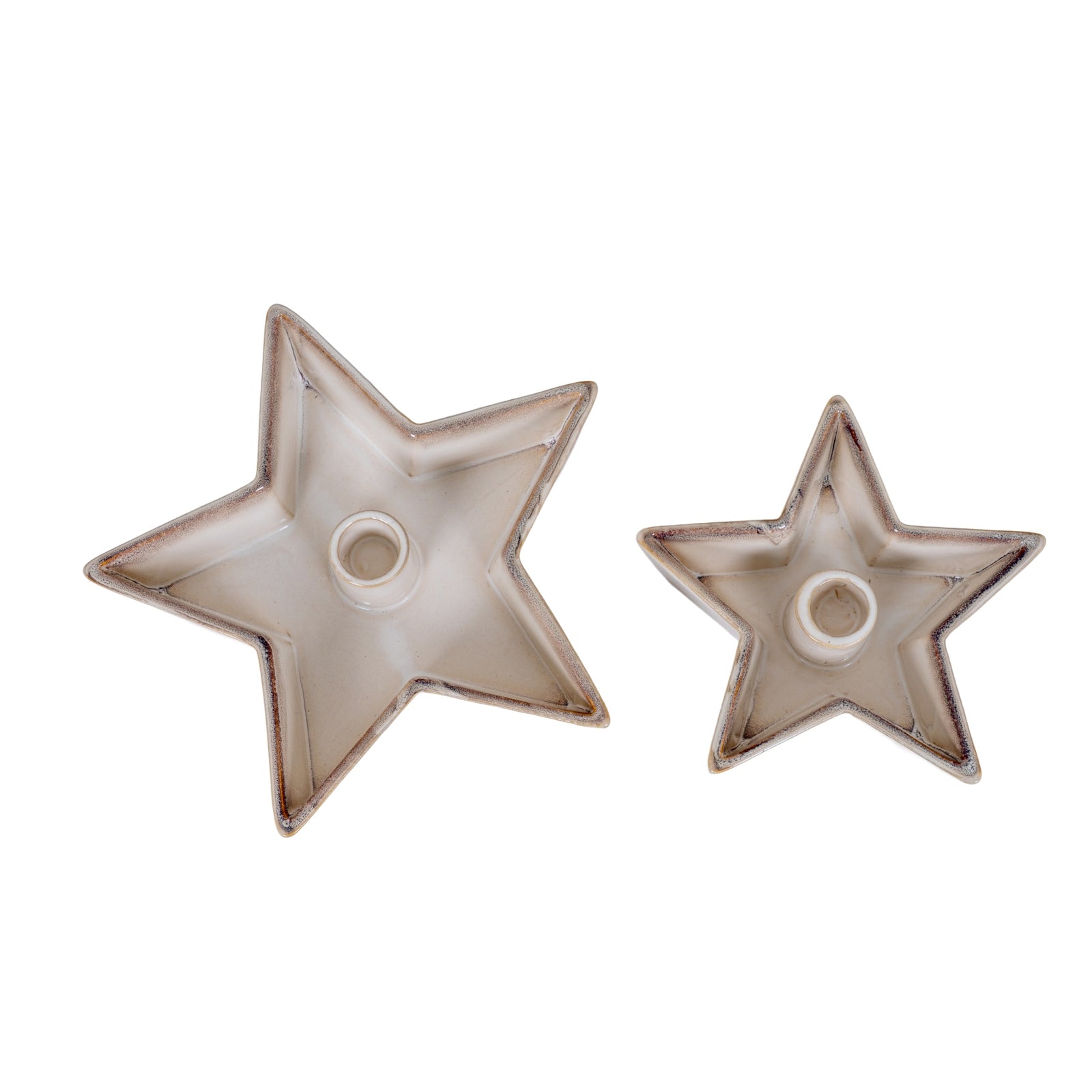Two star-shaped ceramic holders on a white background