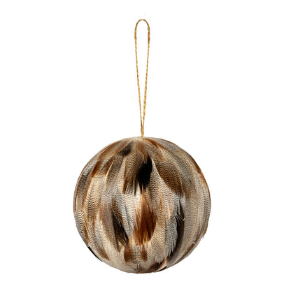 Decorative ball ornament with a gold and brown pattern on a white background