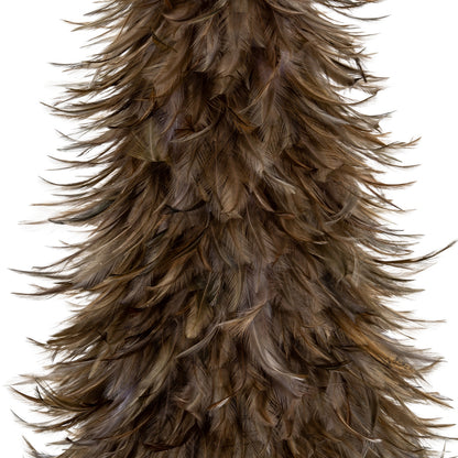 Close-up of a feathered object with a white background