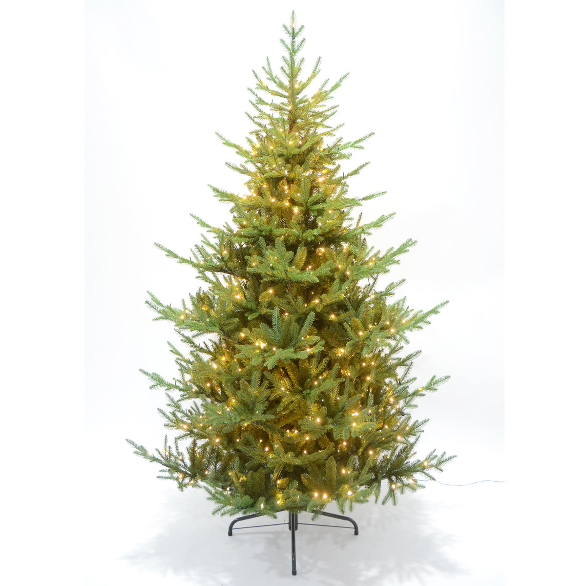 Decorated Christmas tree with lights on a white background