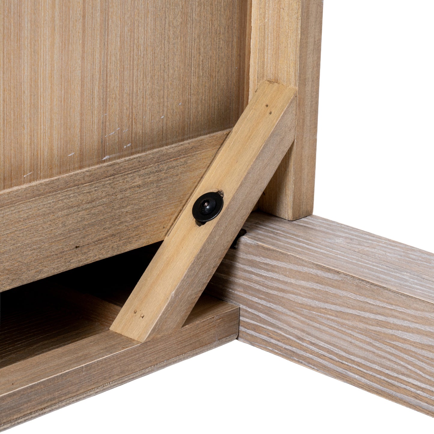 Close-up of a wooden furniture piece with a visible joint and screw.