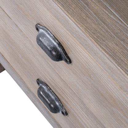 Close-up of wooden drawer with metal handles on a light wood background
