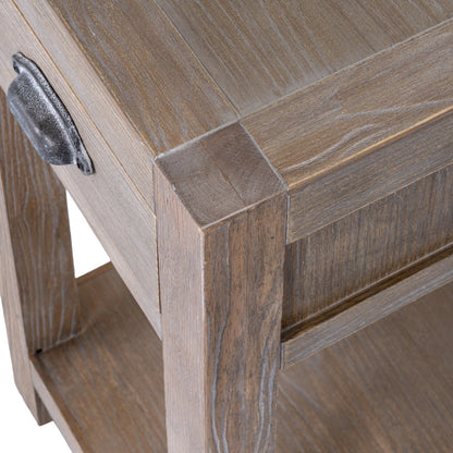 Close-up of a wooden side table with a metal handle on a white background