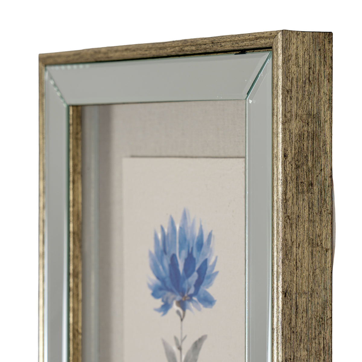 Close-up of a framed wall art piece with a distressed wood frame, clear glass, and a botanical print featuring a blue flower on a light background.