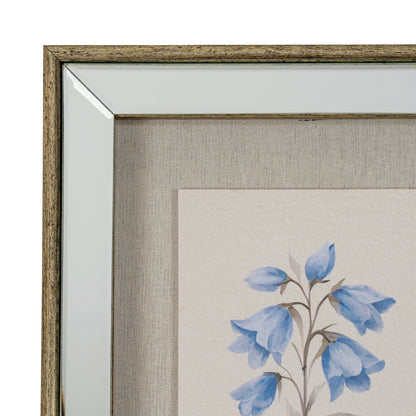 Close-up of a framed floral print showing a textured beige mat, a rustic brown wood frame, and a watercolor-style blue bellflower on cream paper.