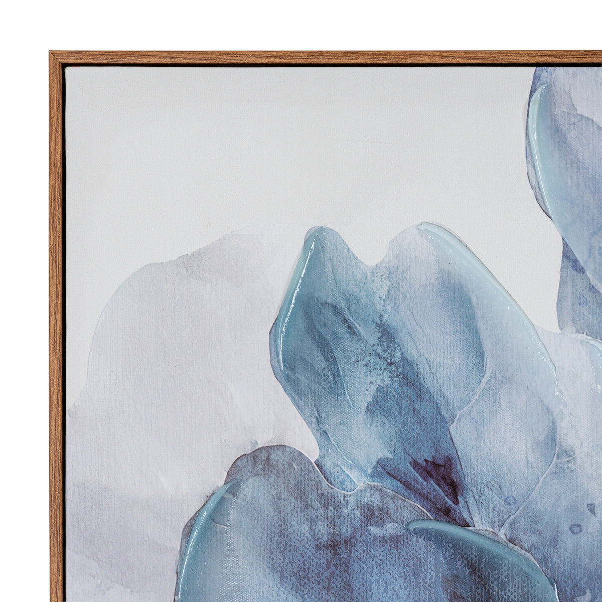 Close-up of a framed abstract watercolor painting featuring soft blue and gray floral or organic shapes on a light background, with a medium brown wooden frame visible.