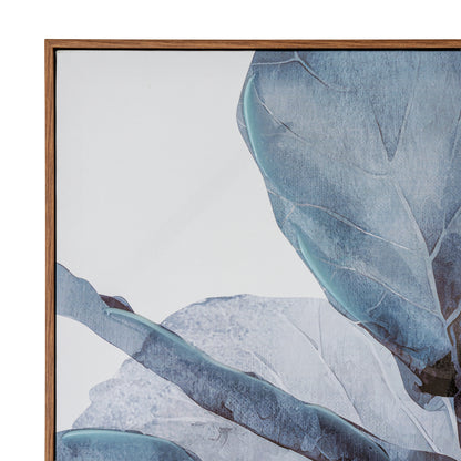 Close-up of a framed abstract botanical artwork showing large blue-gray leaves on a white background, with a medium brown wooden frame visible.