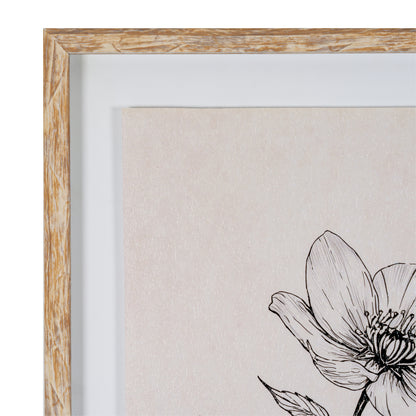 Close-up of a framed art print featuring a black line drawing of a flower on a textured beige background, with a light wood frame and white mat visible.