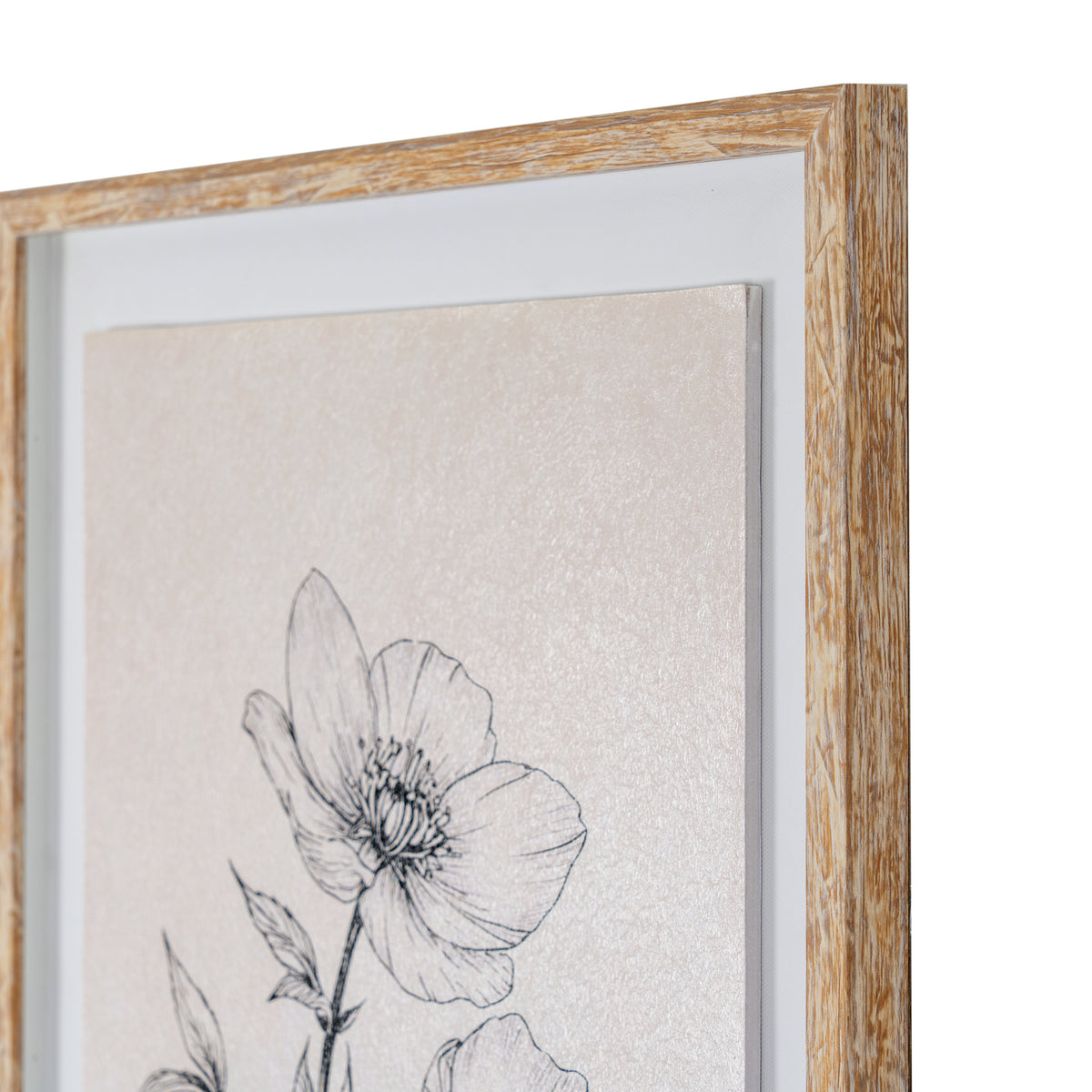 A close-up of a framed botanical art print featuring a black line drawing of a flower on a textured beige background, set in a light natural wood frame with a white mat.