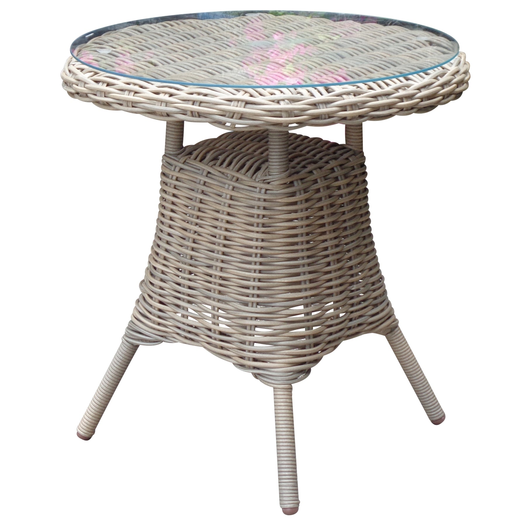 Round wicker table with a glass top on a white background