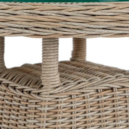 Close-up of a woven wicker stool with a blurred background