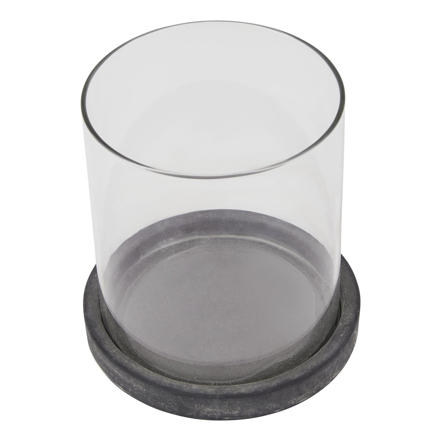 Clear glass container with a black rubber base on a white background