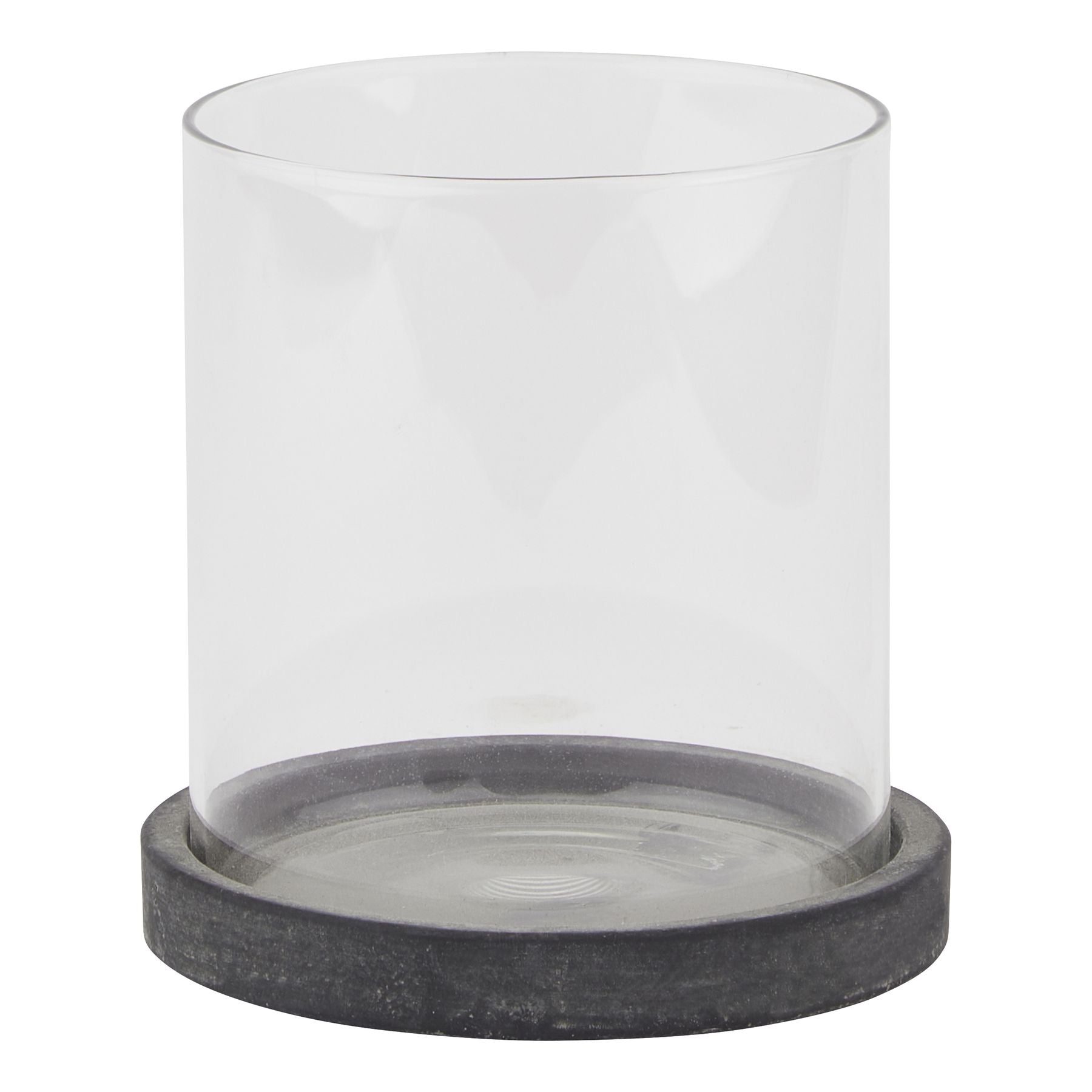 Clear glass candle holder with a dark gray base on a white background