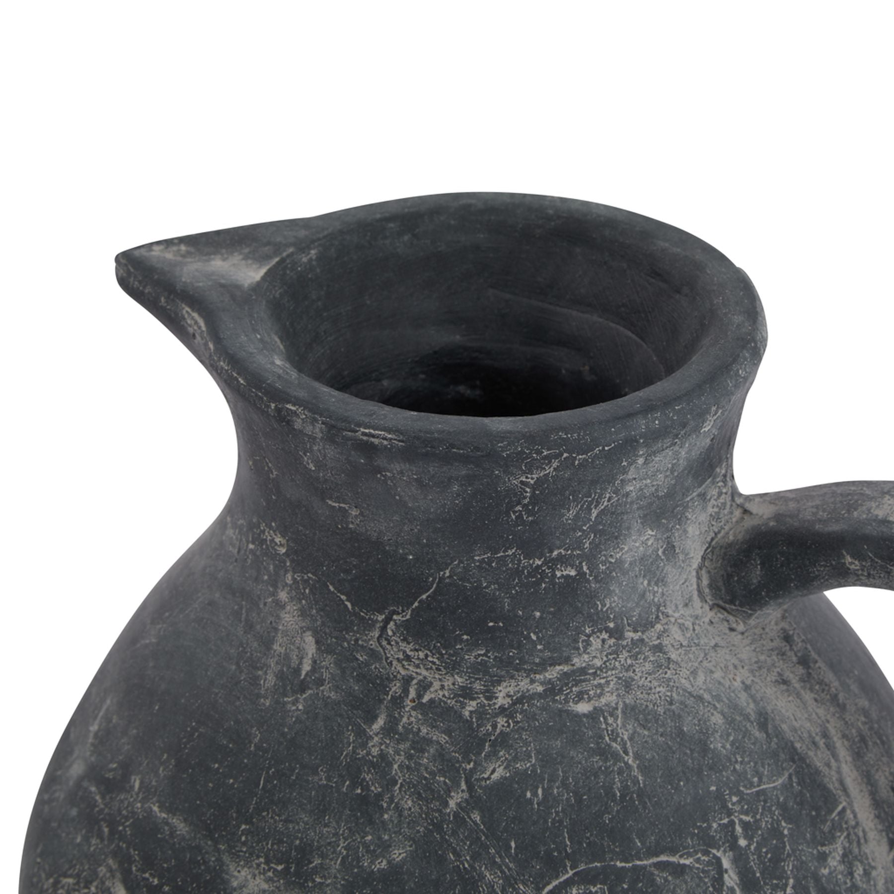 Black ceramic pitcher on a white background