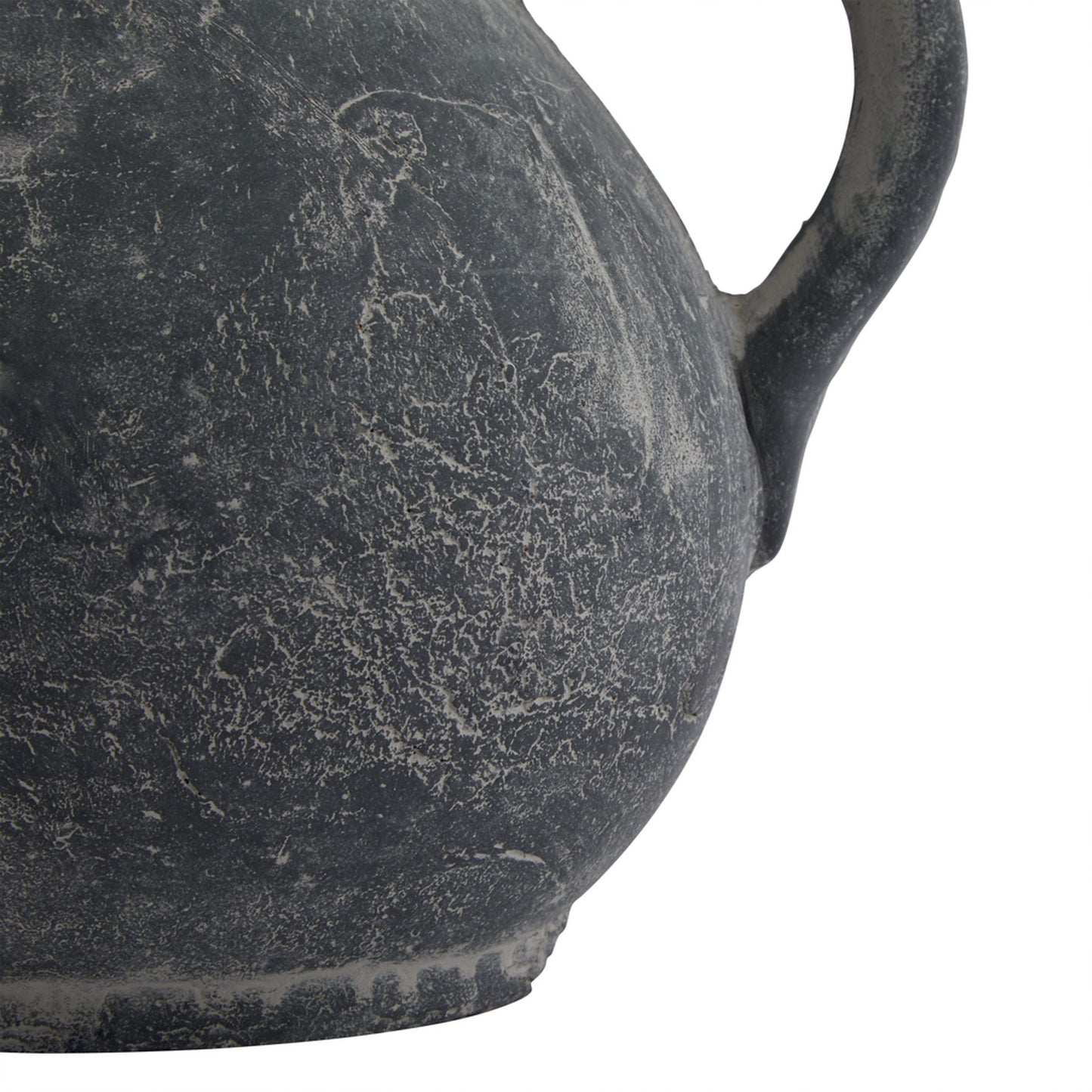 Close-up of a textured black ceramic vase on a white background