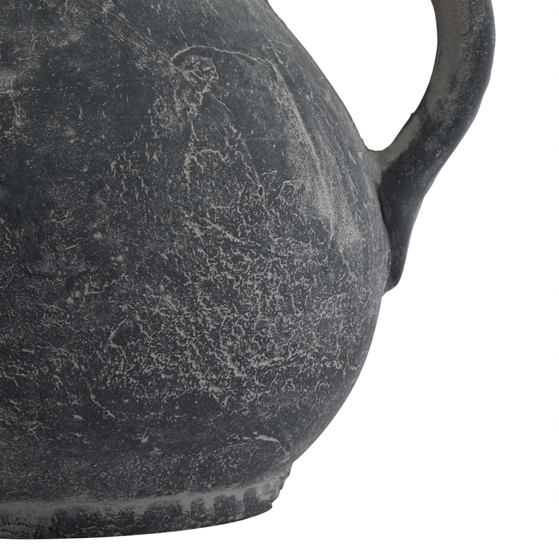 Close-up of a textured black ceramic vase on a white background