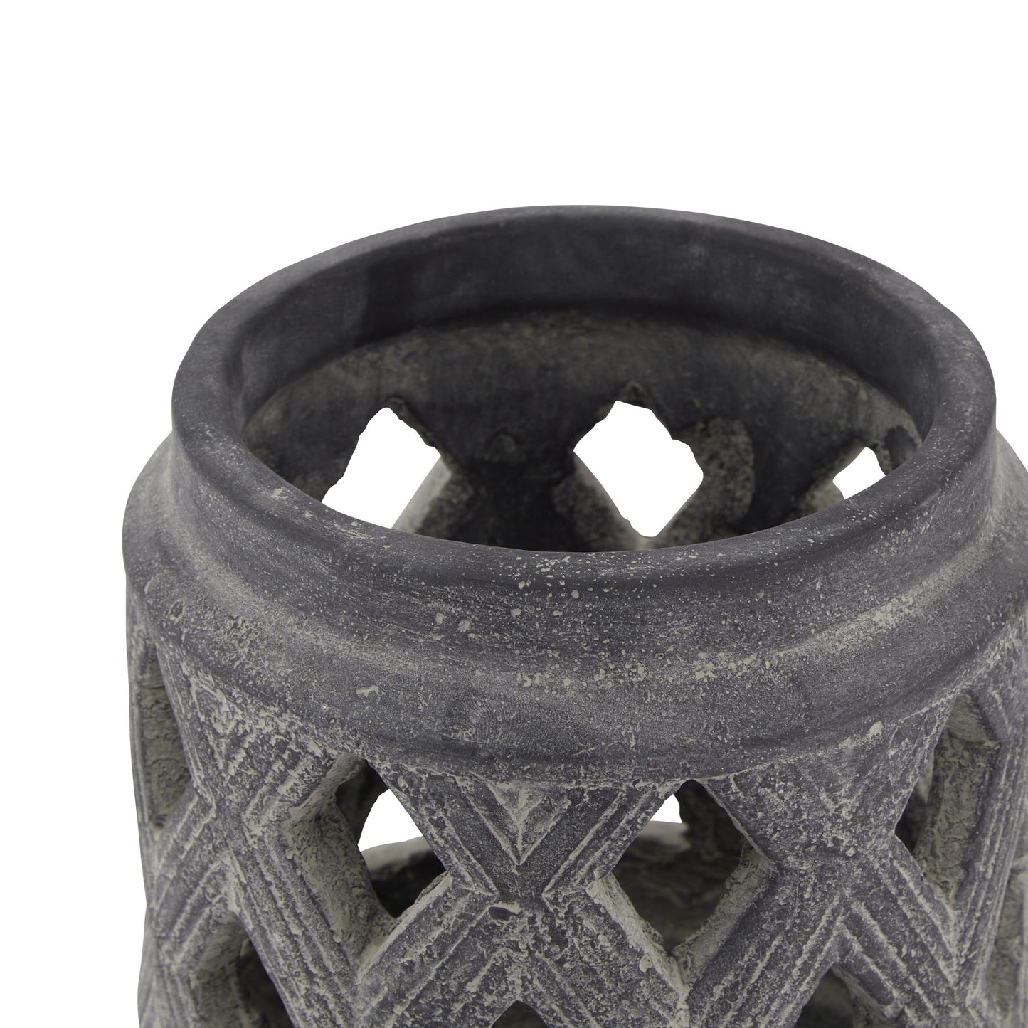 Close-up of a textured black ceramic vase on a white background