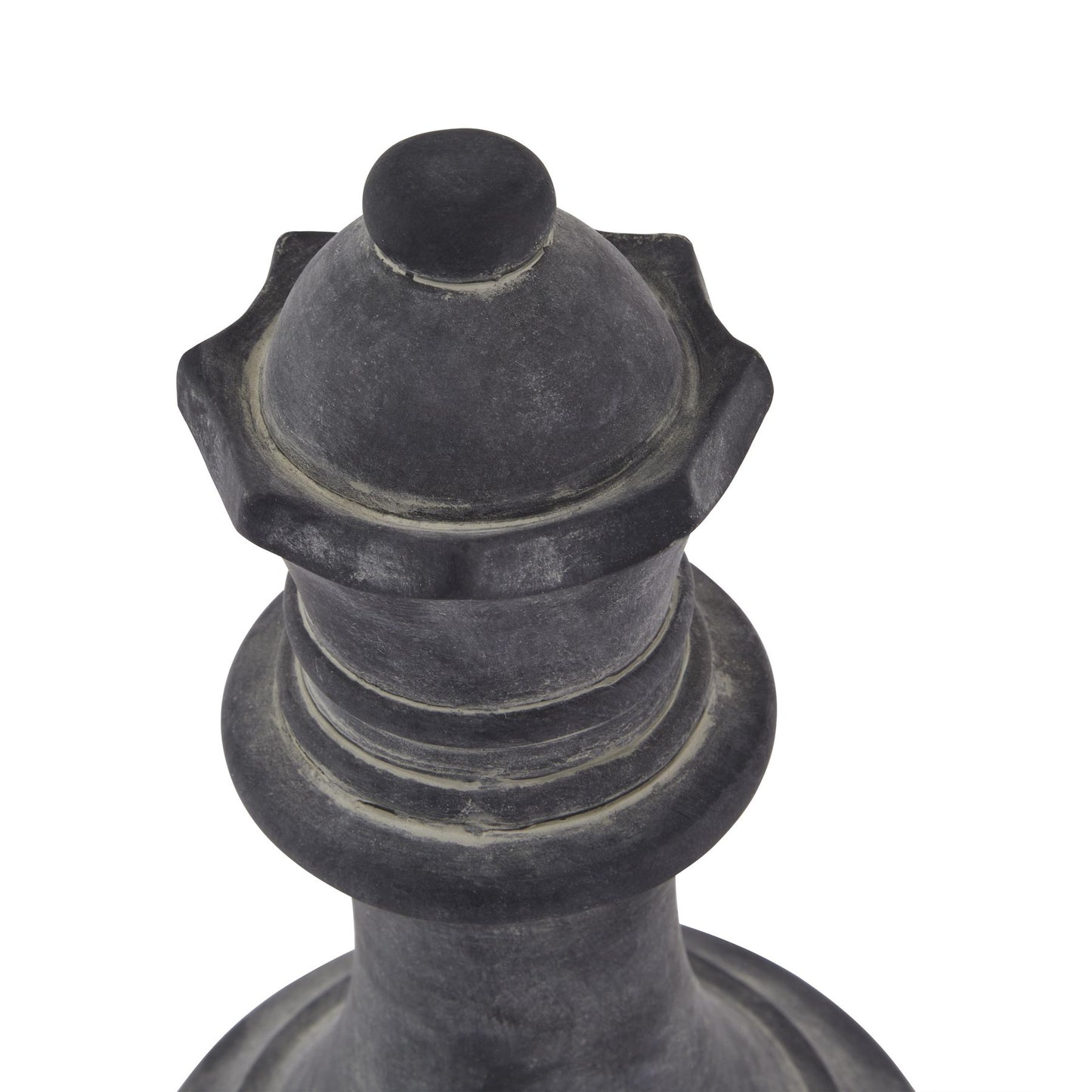 Decorative black metal finial on a white background