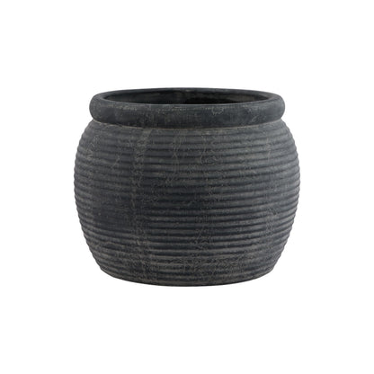 Black ribbed pot on a white background