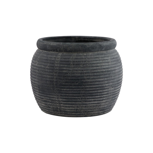 Black ribbed pot on a white background