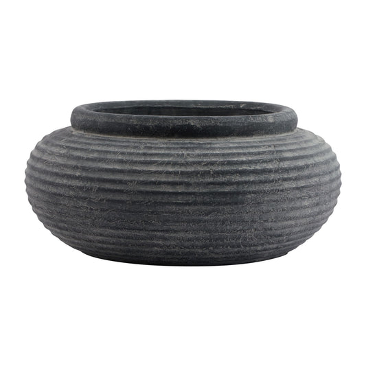 Black ribbed pot on a white background