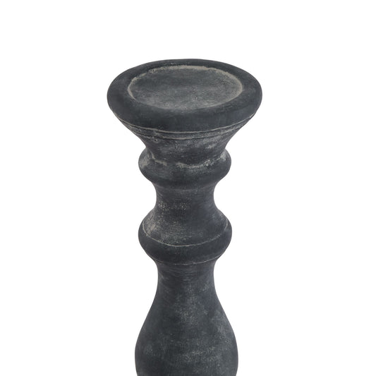 Black candle holder on a white background