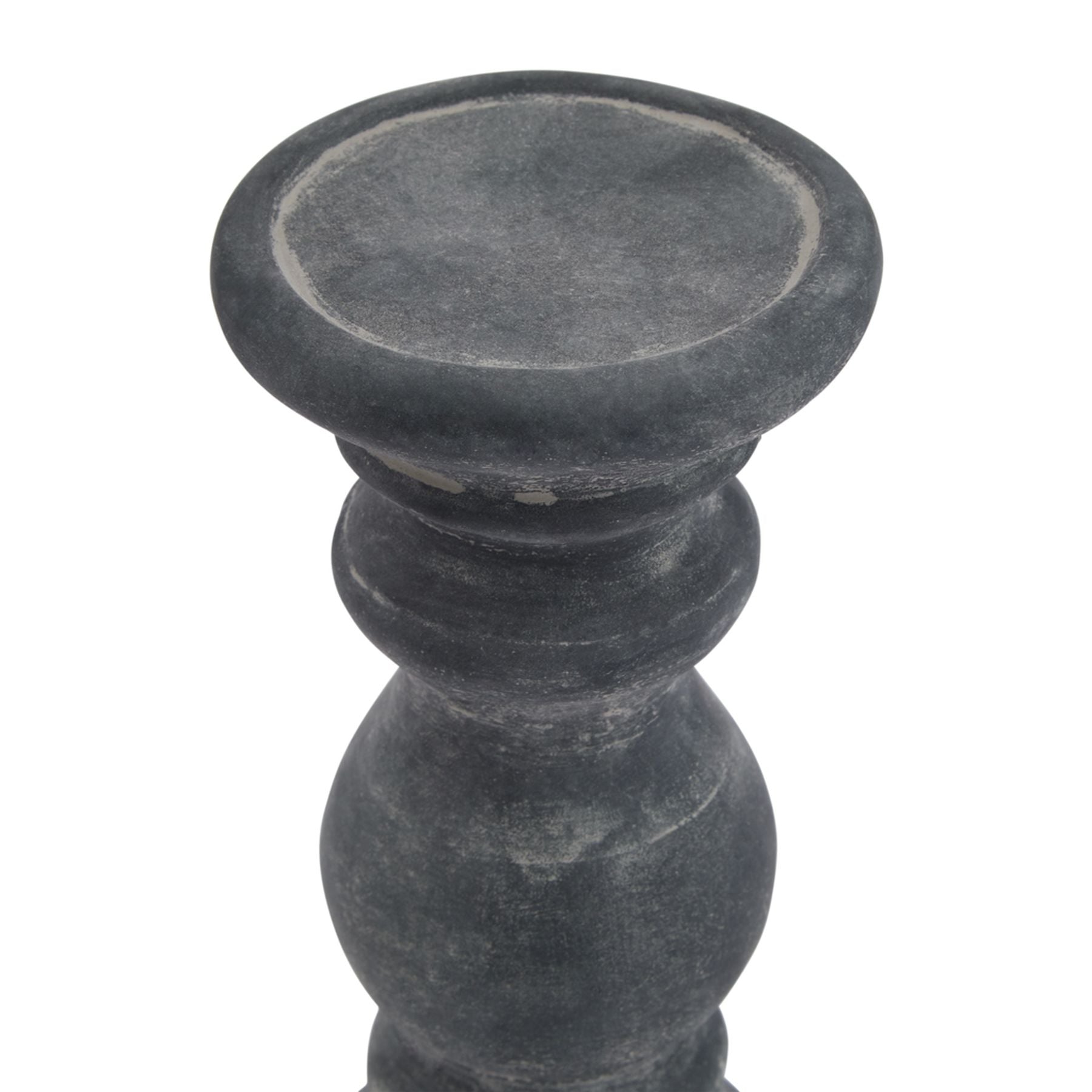 Dark gray stone candle holder on a white background