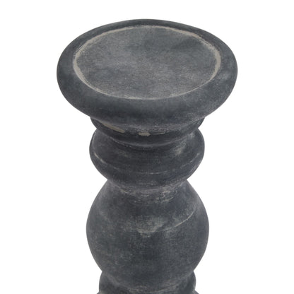 Dark gray stone candle holder on a white background