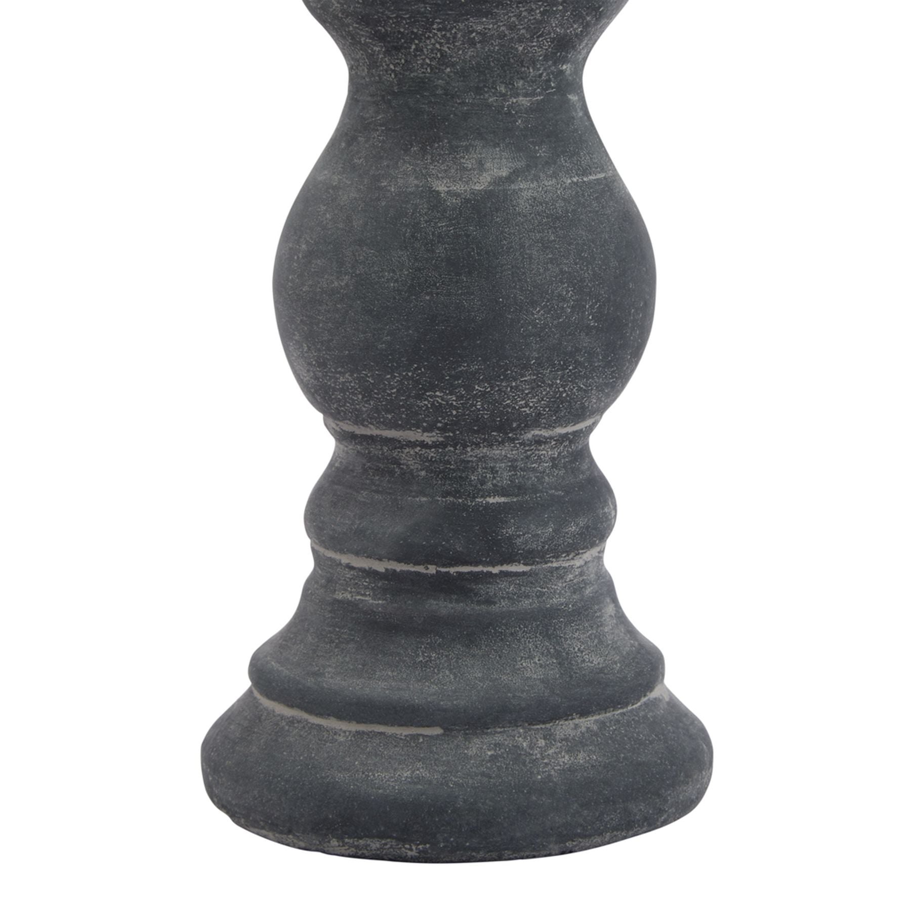 Dark gray stone pedestal on a white background