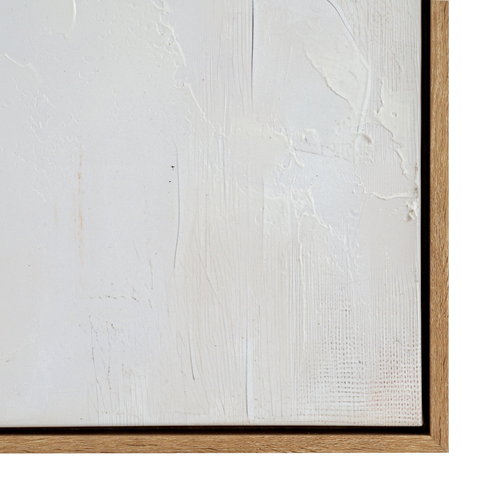 Close-up of a textured white canvas with a wooden frame on a white background