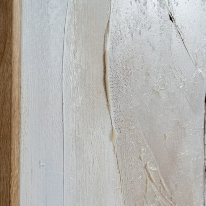 Close-up of a textured surface with a wooden edge