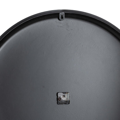 Close-up of a gray metal surface with a small rectangular component on a white background