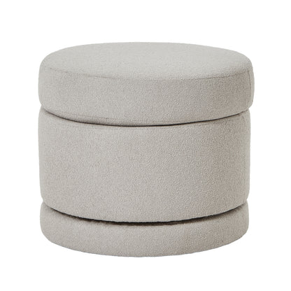 Round beige ottoman with a stackable design on a white background