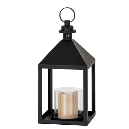Black lantern with a candle inside on a white background