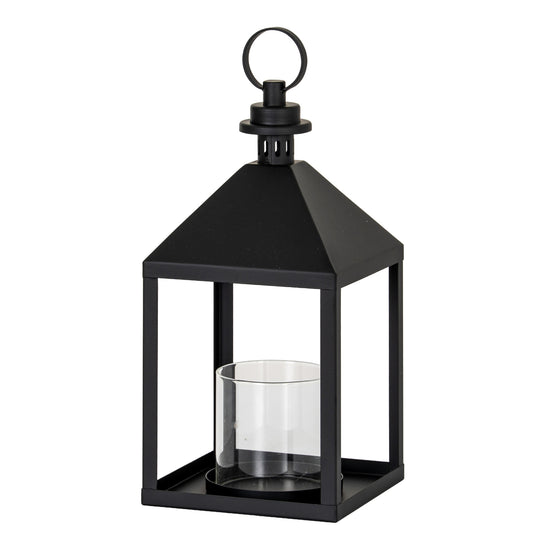 Black lantern with a clear glass holder on a white background