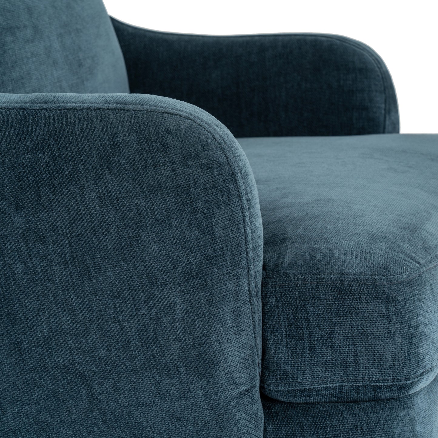 Close-up of a blue textured sofa with a neutral background