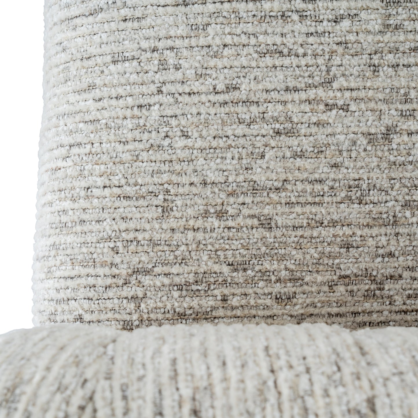 Close-up of a textured fabric surface with a neutral color palette.