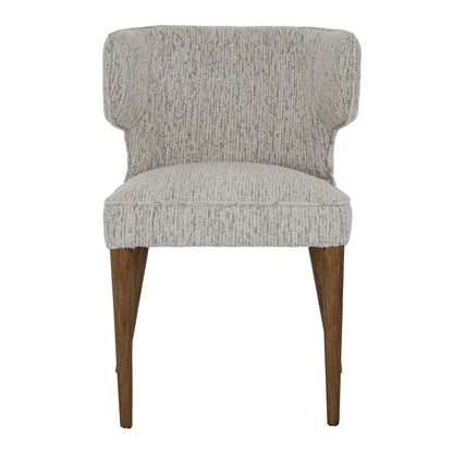 Gray upholstered chair with wooden legs on a white background