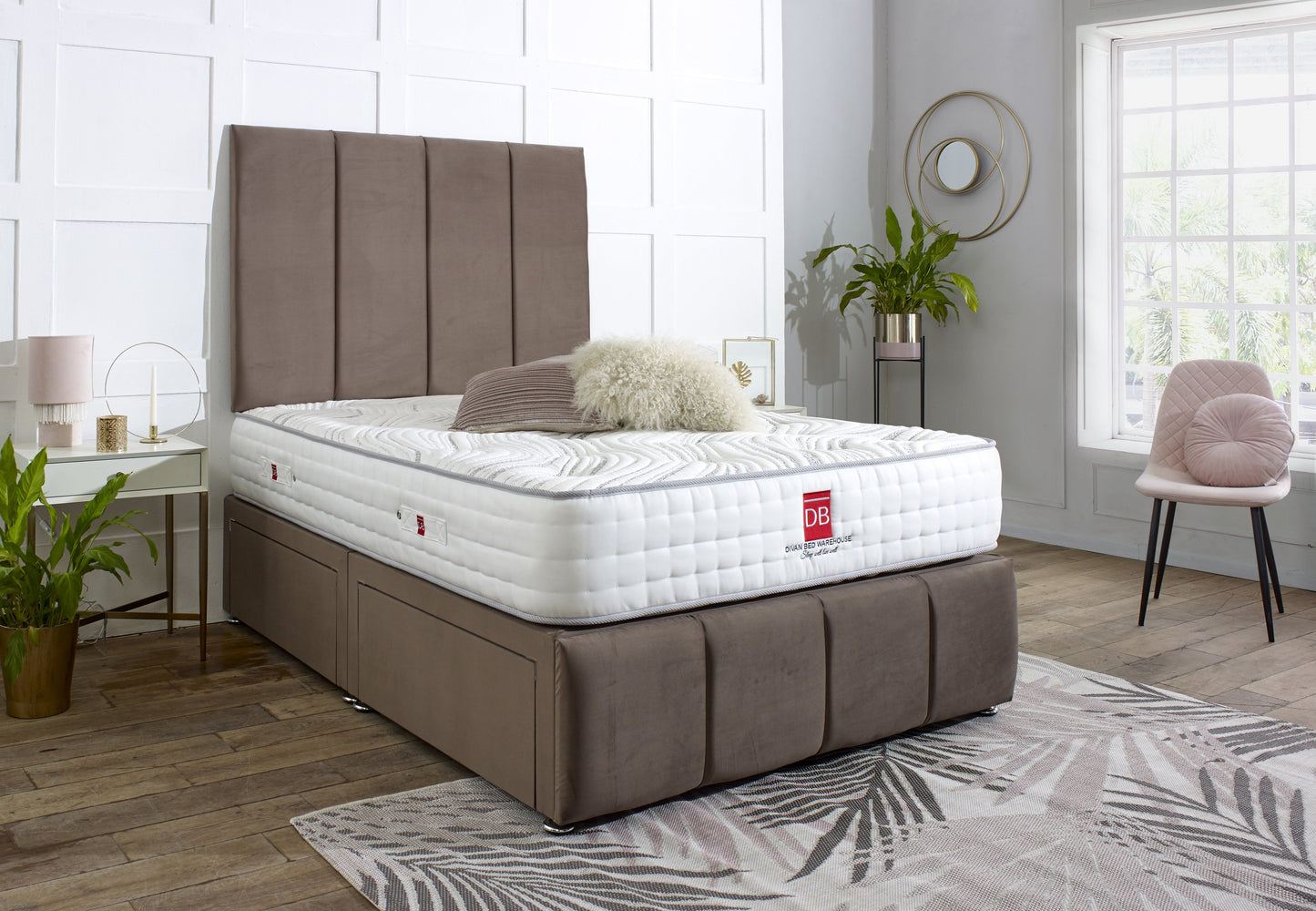 Bed with white mattress and brown frame in a bedroom setting