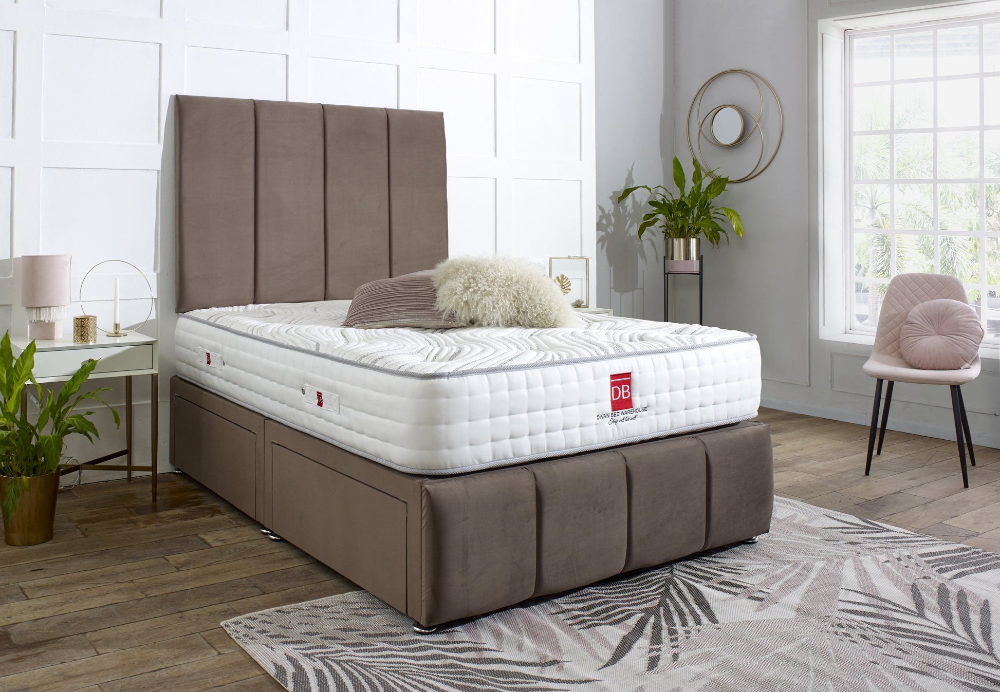 Bed with white mattress and brown frame in a bedroom setting
