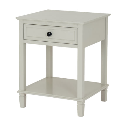 White side table with a drawer on a white background