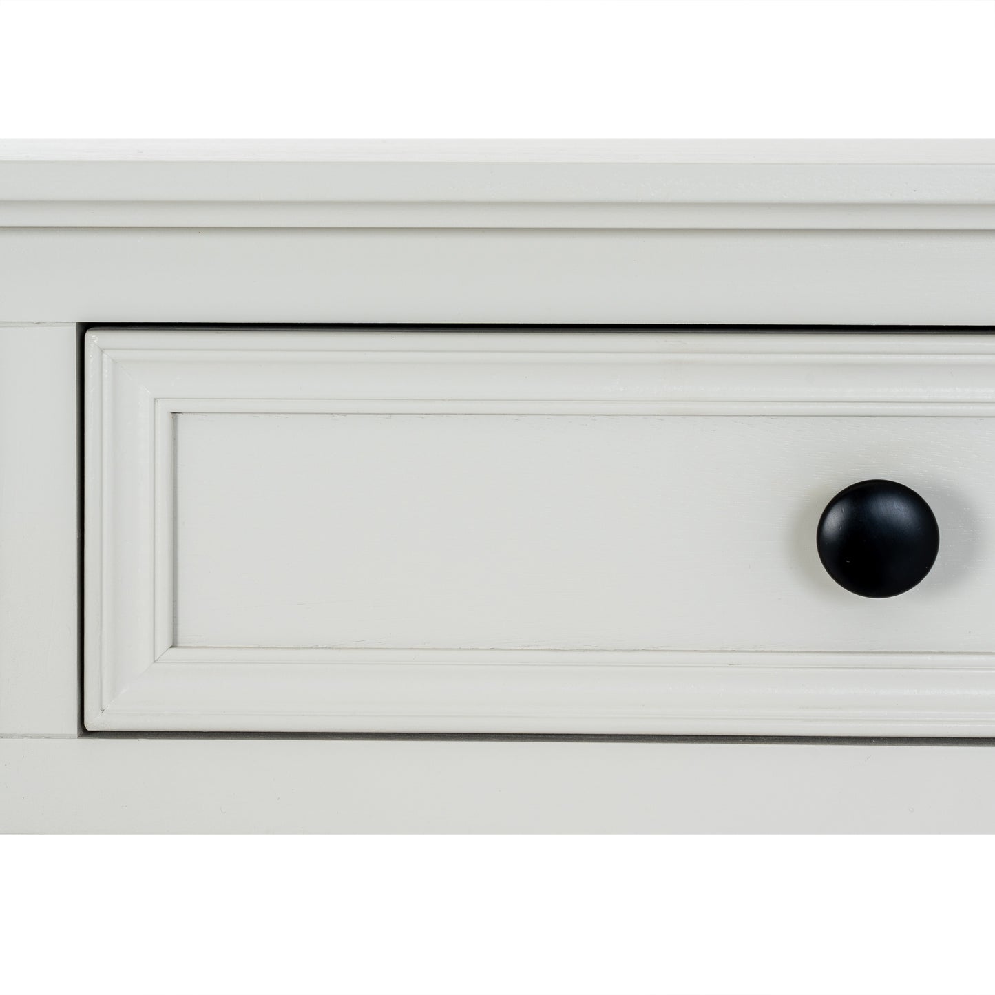 White cabinet with a black knob on a white background