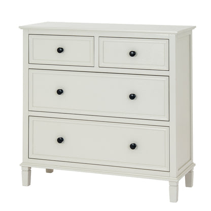 White dresser with four drawers and black knobs on a white background