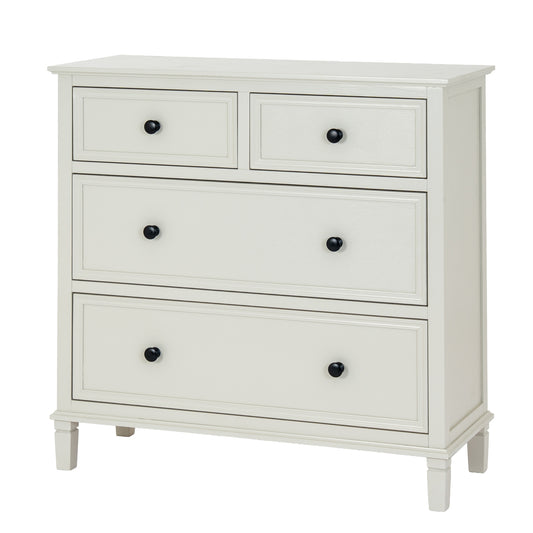 White dresser with four drawers and black knobs on a white background