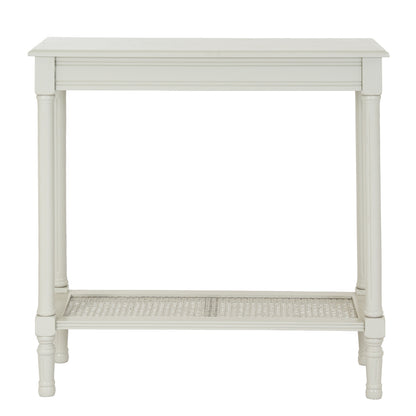 White console table with a woven shelf on a white background