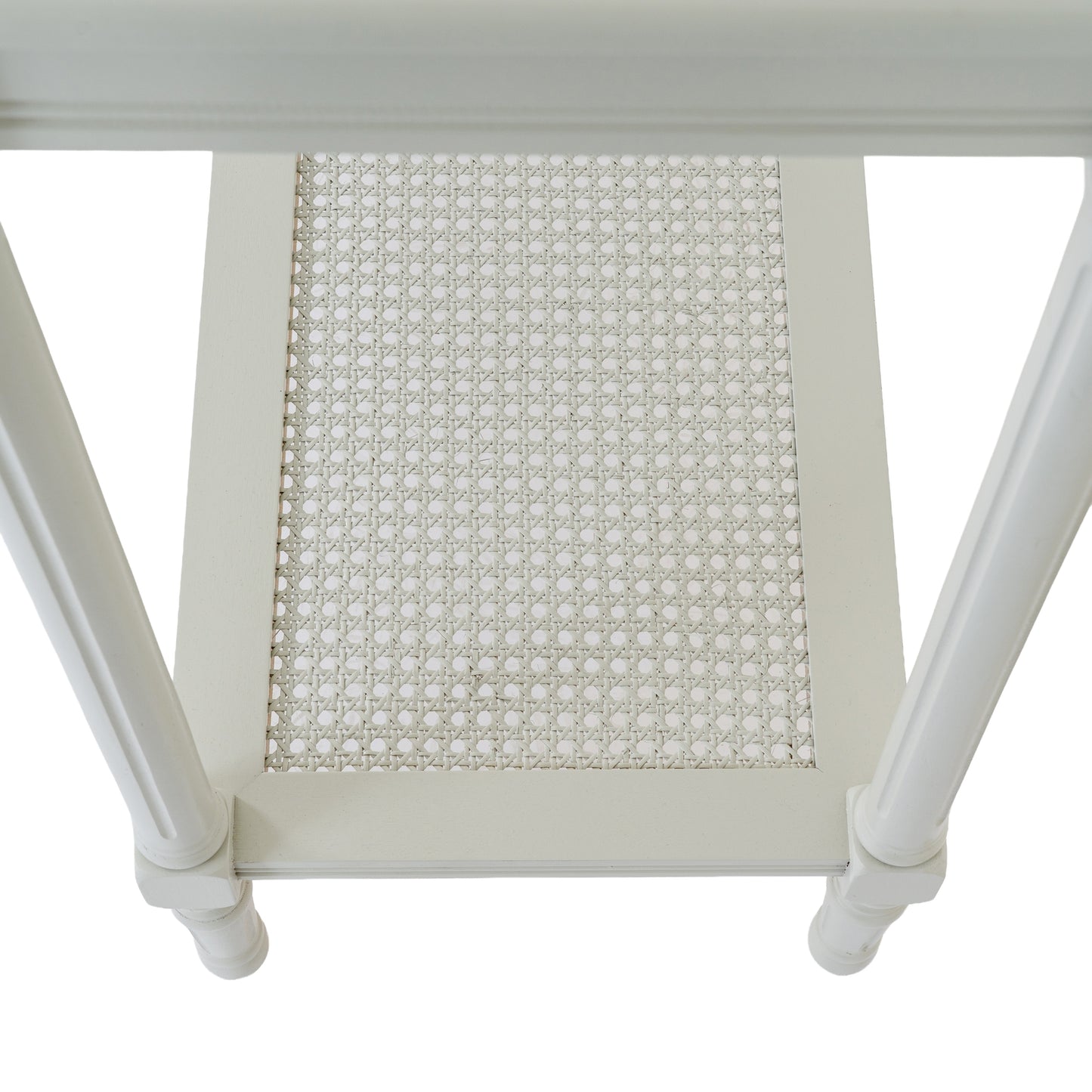 Close-up of a white chair with a woven seat on a white background