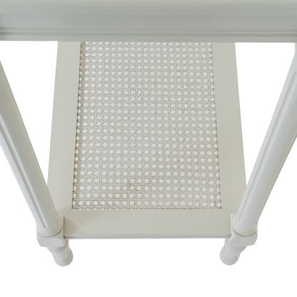 Close-up of a white chair with a woven seat on a white background