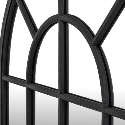 Close-up of a black metal window frame with a white background