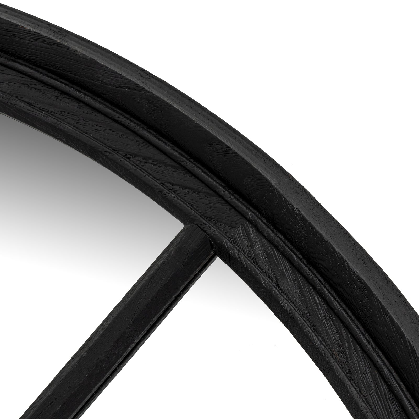 Close-up of a black framed mirror on a white background