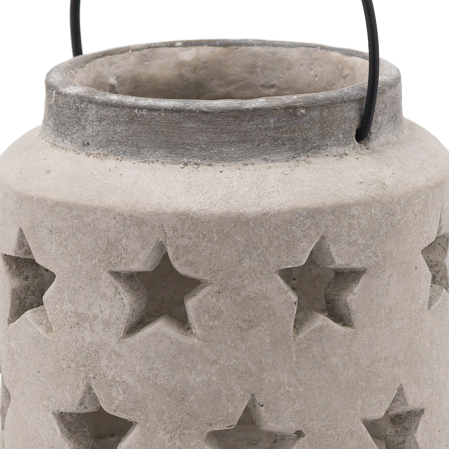 Concrete lantern with star cutouts on a white background